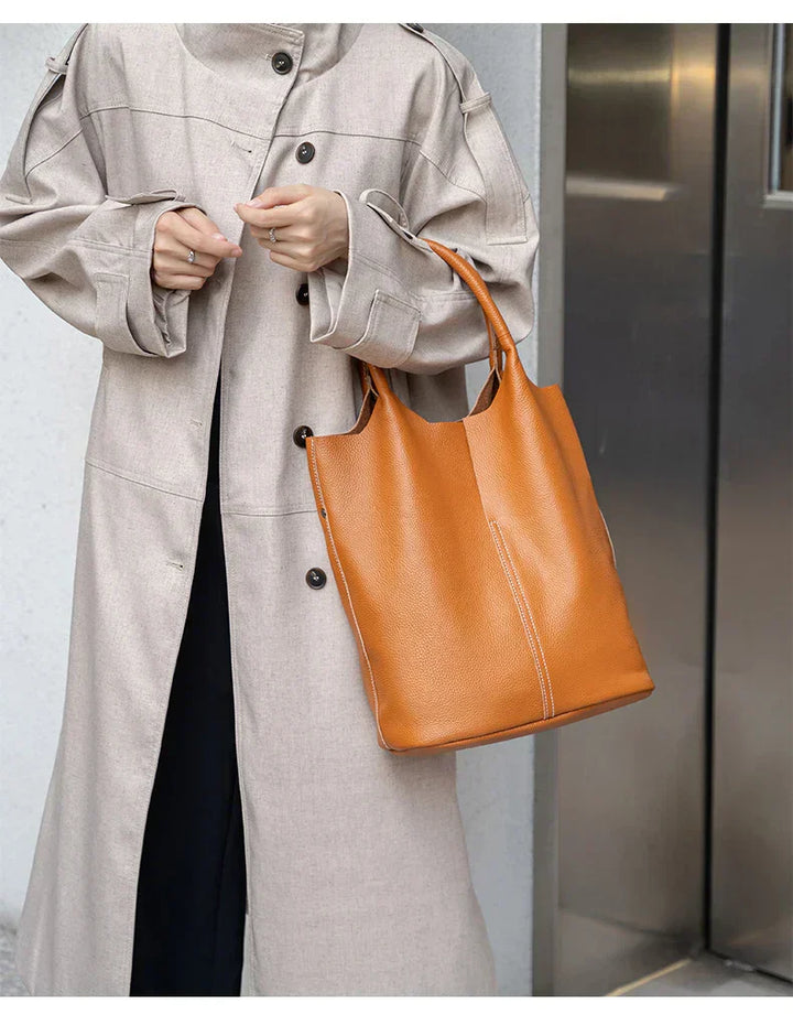 Light blue bucket bag with a luxurious leather look