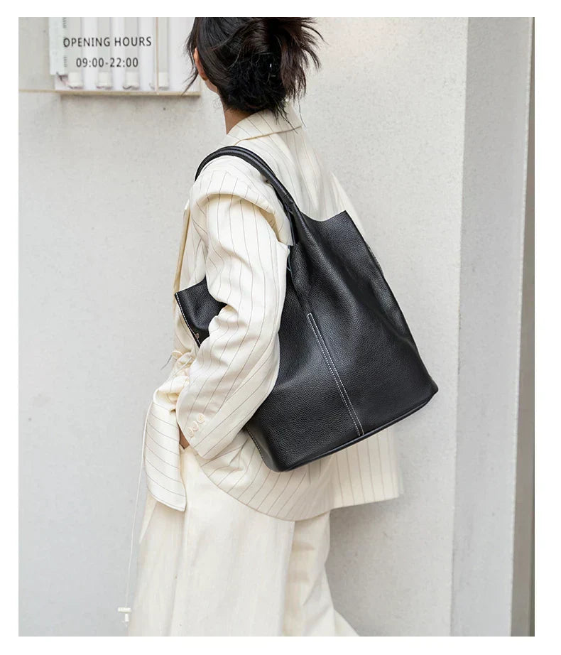 Light blue bucket bag with a luxurious leather look