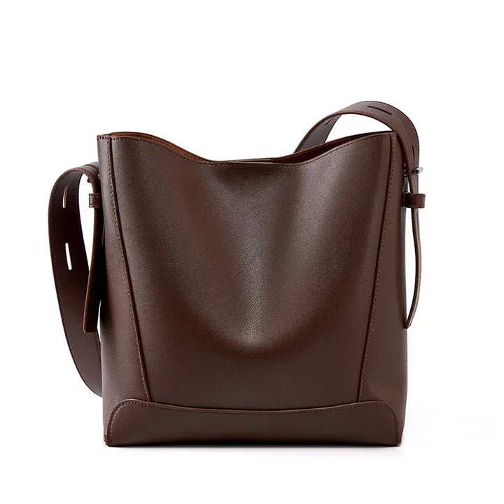 tine™ – Elegant shoulder bag in a sandy shade with strap-inspired handles