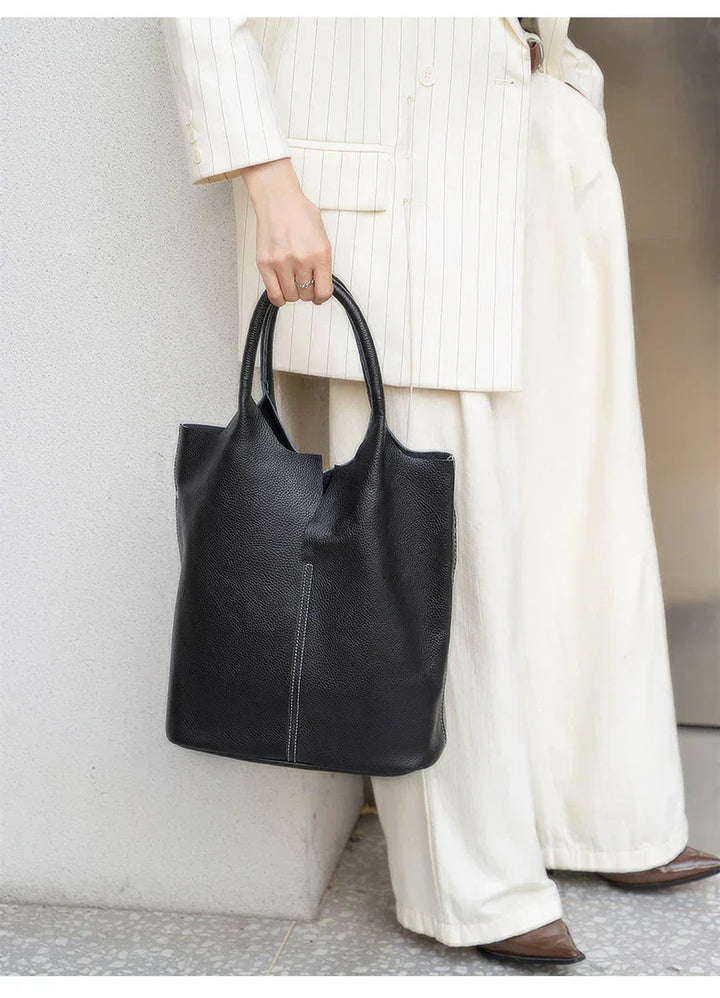 Light blue bucket bag with a luxurious leather look