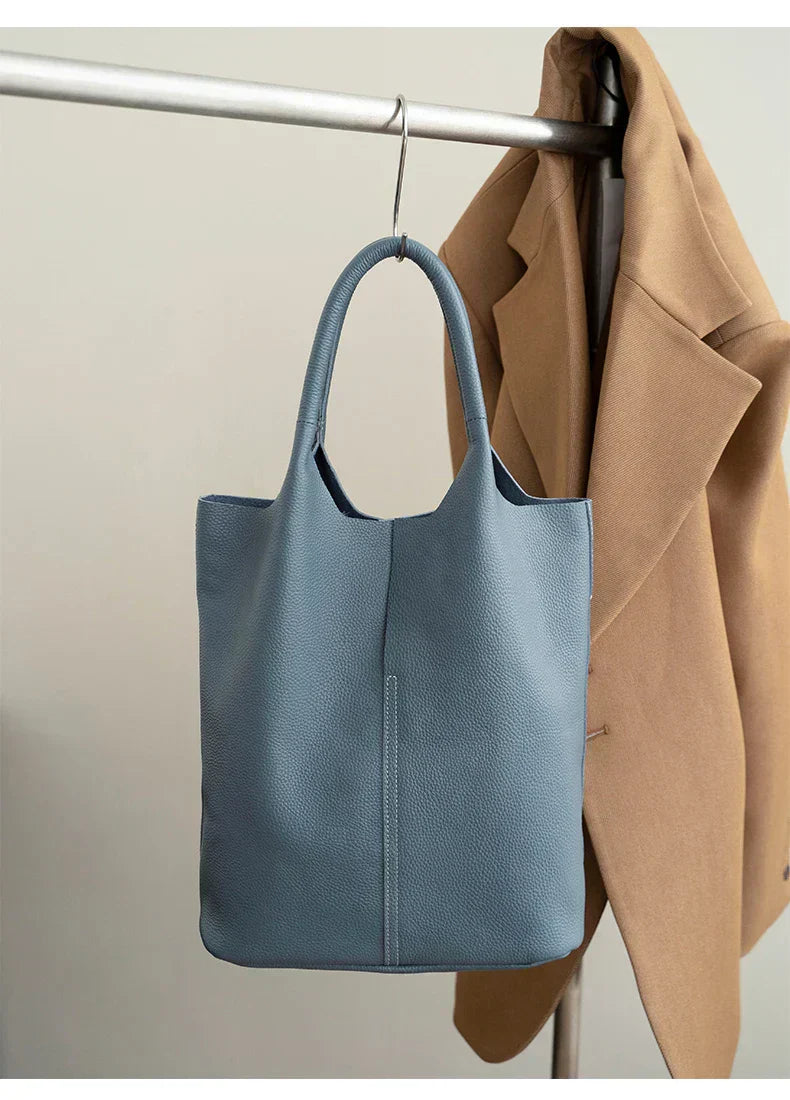 Light blue bucket bag with a luxurious leather look