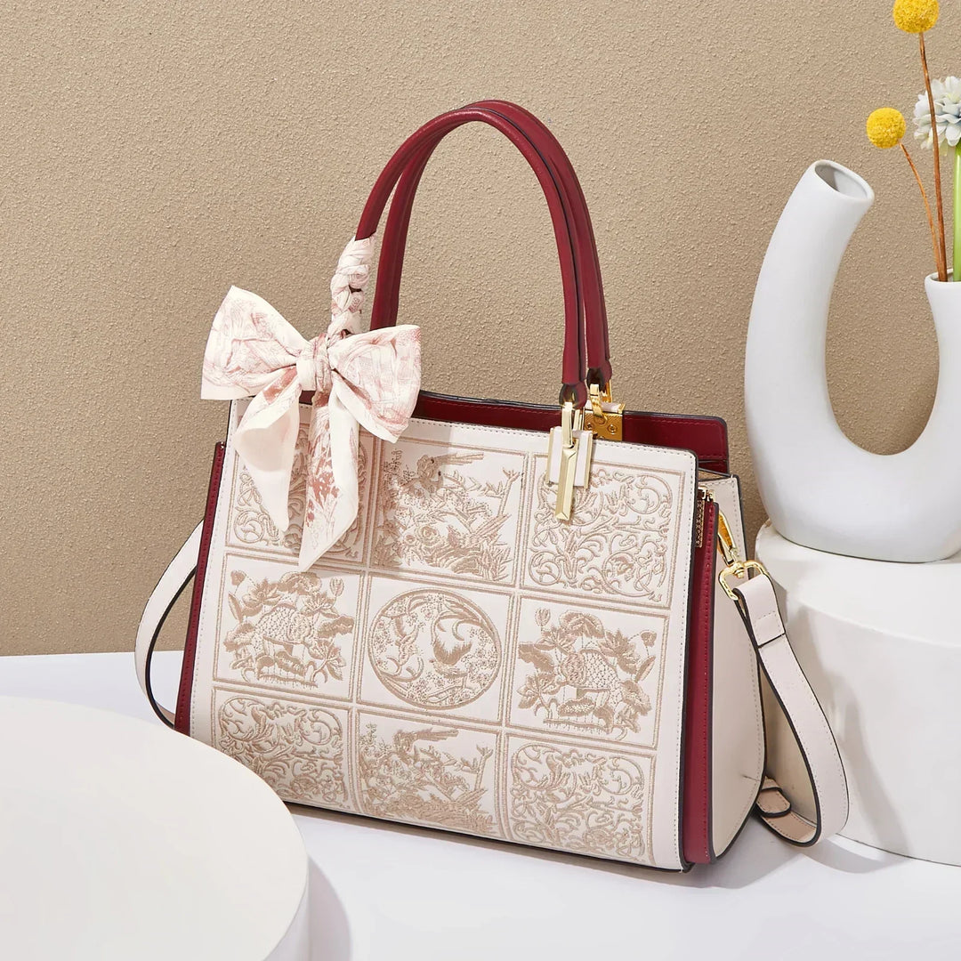 Sylvia™ – Unique crossbody bag with embroidery and bow